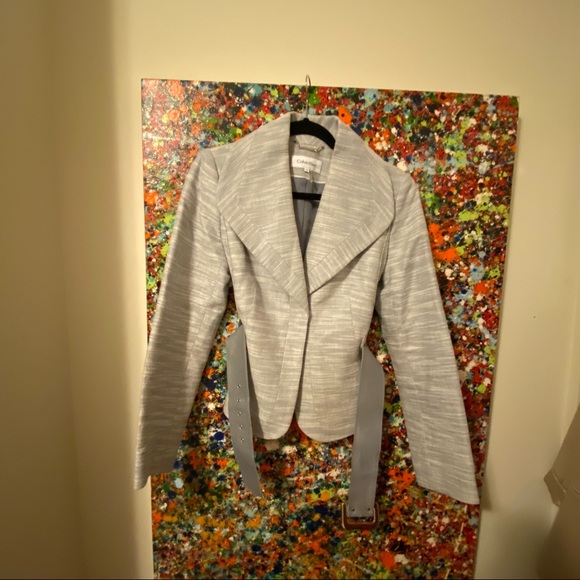 Designers fitted Calvin Klein blazer with a belt
